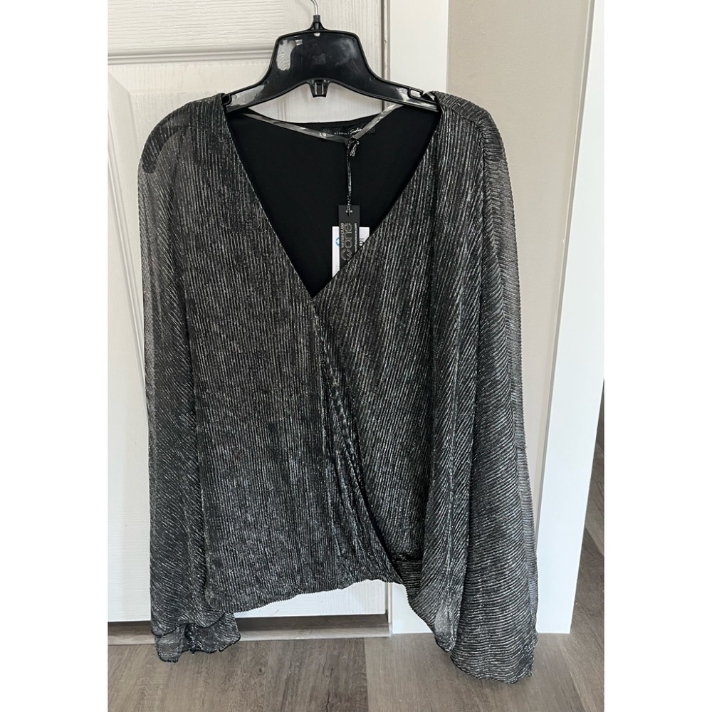 Sparkly shirt with bat wing sleeves